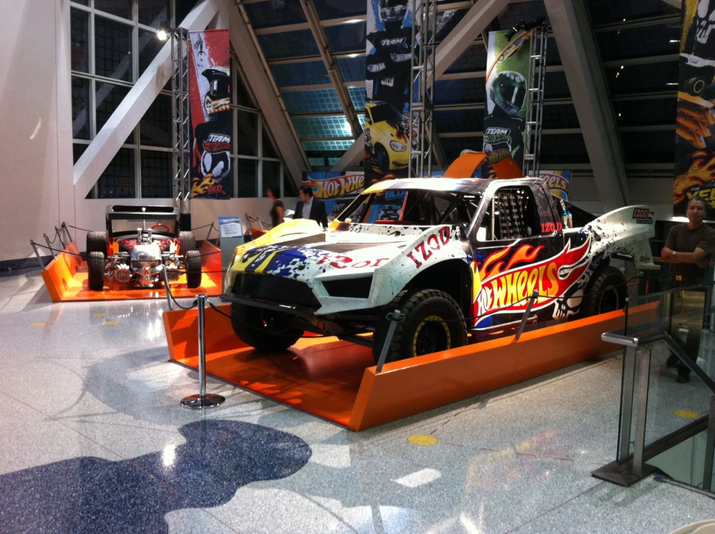 Hot Wheels Jump Truck on display at an exhibit, showcasing the iconic design and vibrant colors. Click to watch the world record jump video!